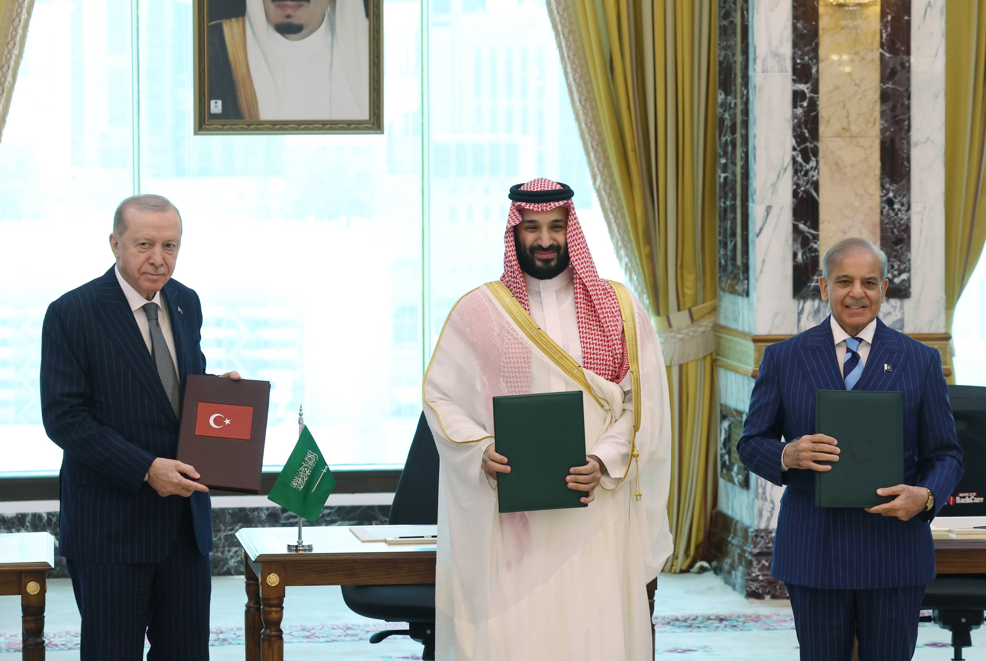 Turkey, Saudi Arabia, Pakistan sign defense pact treating attack on one as attack on all