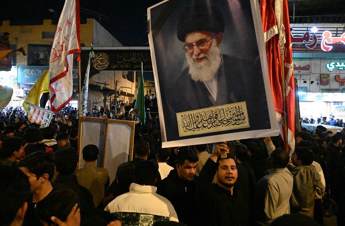 *Irak'ın Basra kentinde, İran lideri Hamaney'in öldürülmesi protesto edildi, 2 Mart 2026. (Fotoğraf: AA)