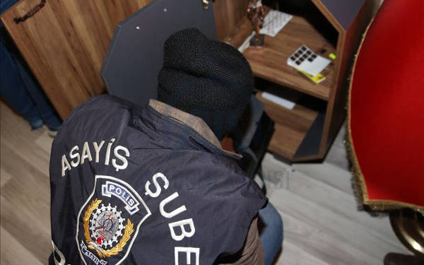 Forty-six police officers among 105 detained in anti-corruption sweep