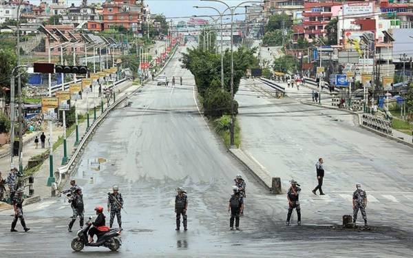 /haber/nepalin-gecici-basbakani-karkiden-sukunet-cagrisi-311476