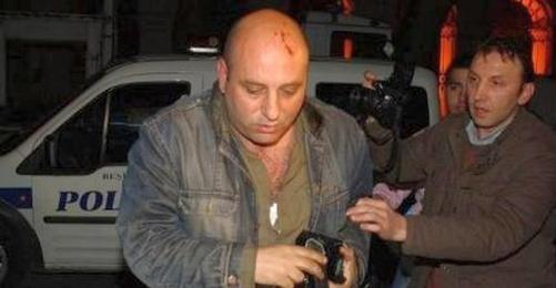 Journalist Attacked by Gaddafi's Body Guards and then Arrested 