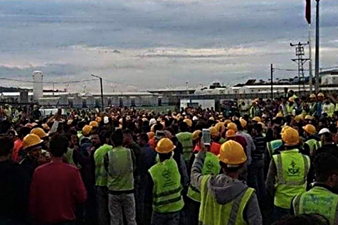 "Behind The Glass and Steel of Erdogan's Newest Mega-Project, Sit Jailed Construction Workers" 