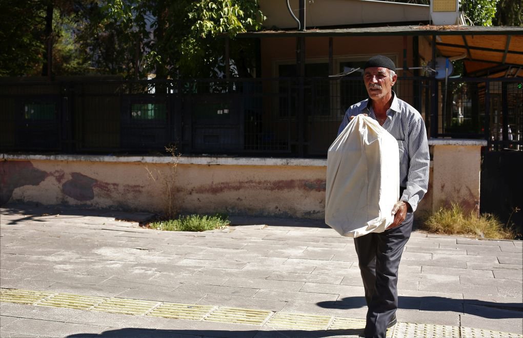 Kurdish man given bones of son in a bag seven years after his killing in conflict