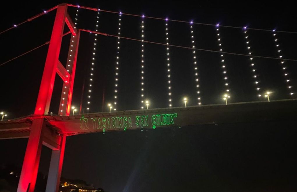 'Go insane as we exist': LGBTI+ activists project Pride Parade message onto Bosphorus Bridge
